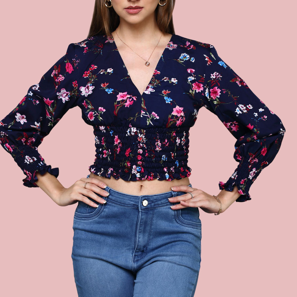 
                      
                        Navy Blue V-neckline printed top with ruching at sleeve and waist
                      
                    