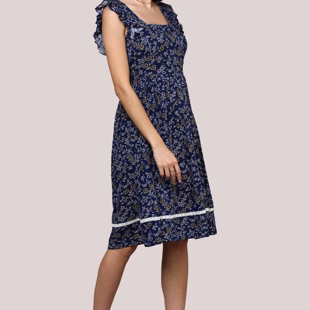 
                      
                        Navy Blue Floral dress with square neckline and lace detail
                      
                    