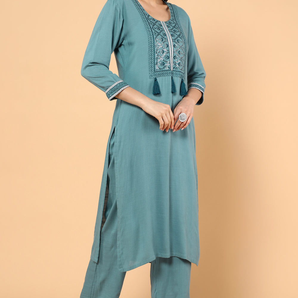 
                      
                        Women Ethnic Motifs Embroidered Sequinned Kurta With Trousers
                      
                    