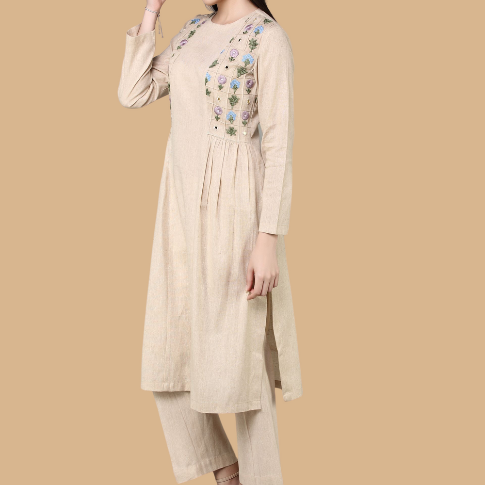 
                      
                        Panneled Kurta With Embroidered Side Yoke With Straight Fit Pants
                      
                    