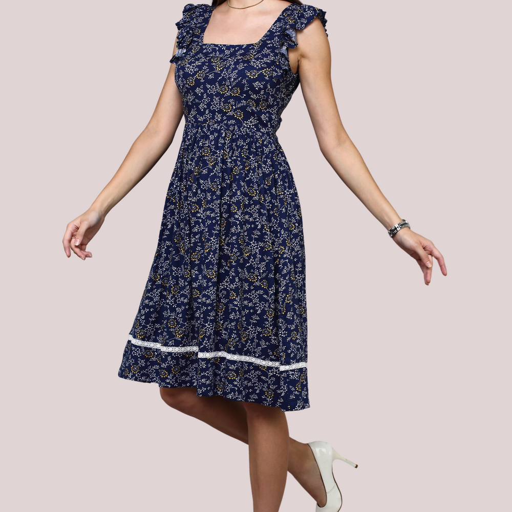 
                      
                        Navy Blue Floral dress with square neckline and lace detail
                      
                    