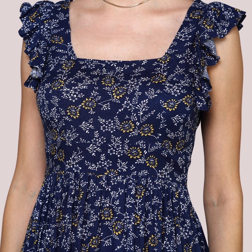 
                      
                        Navy Blue Floral dress with square neckline and lace detail
                      
                    