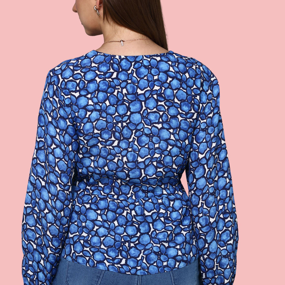 
                      
                        V- neckline Blue Printed  top with lace detail ,balloon sleeve
                      
                    