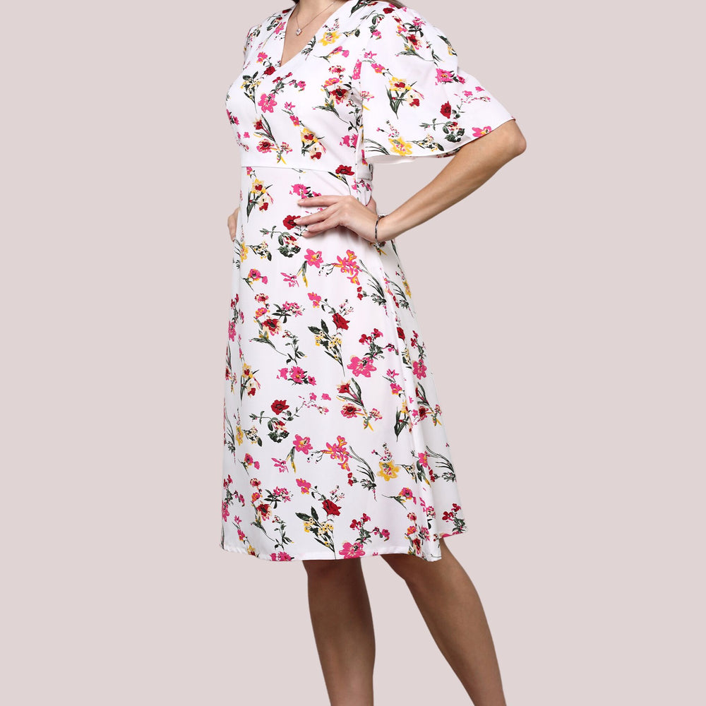 
                      
                        White Floral printed dress with flared sleeve
                      
                    