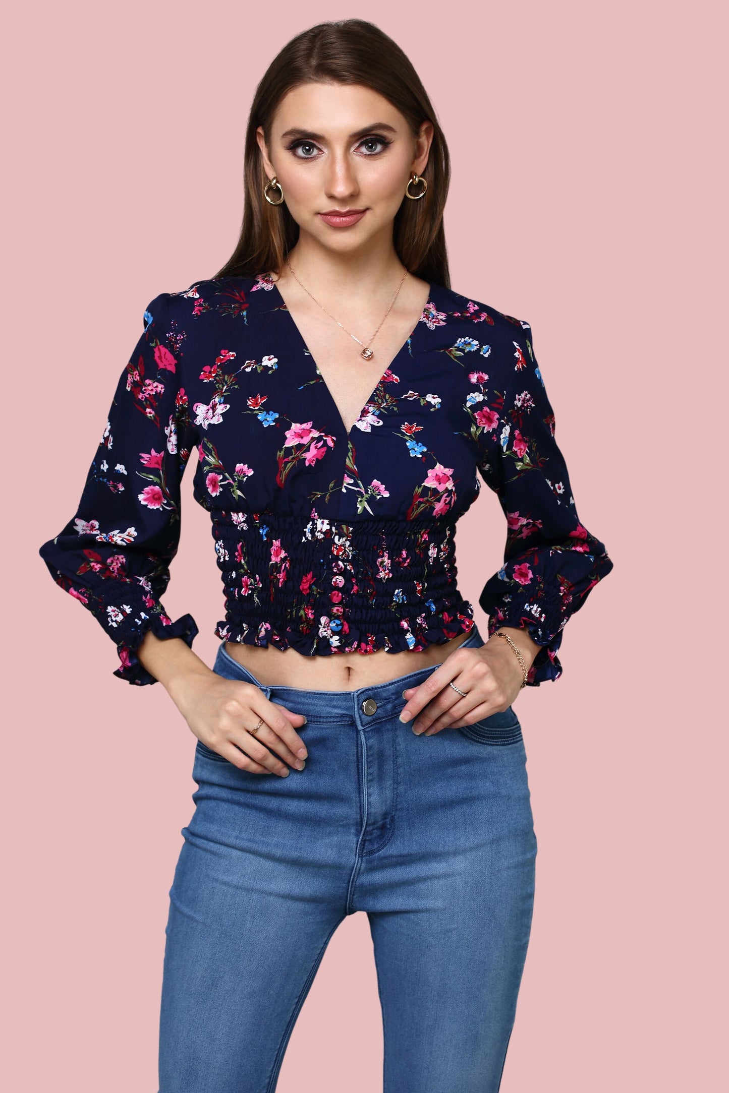 Navy Blue V-neckline printed top with ruching at sleeve and waist