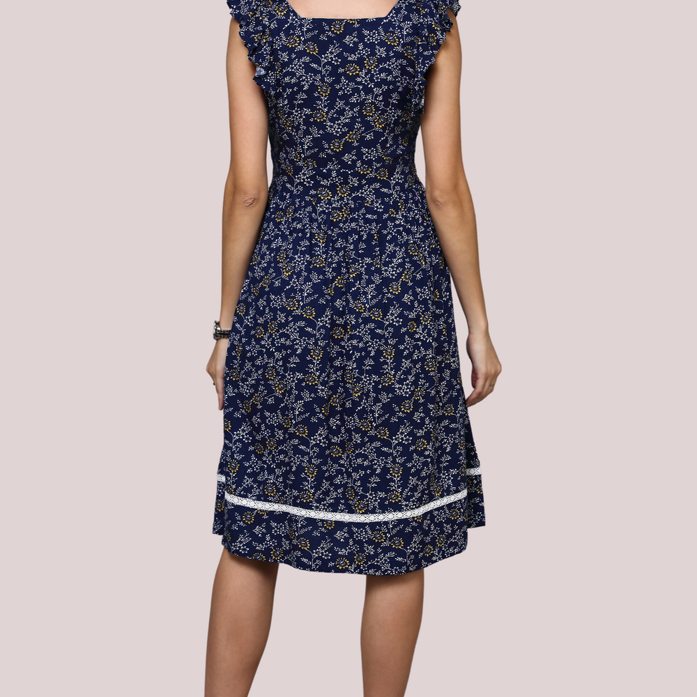 
                      
                        Navy Blue Floral dress with square neckline and lace detail
                      
                    