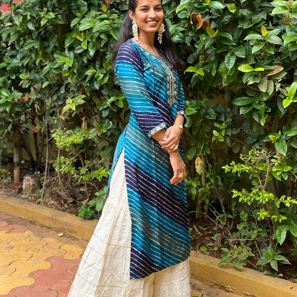 
                      
                        Shades Of Blue Leheriya Kurta with Gota Pati Work
                      
                    