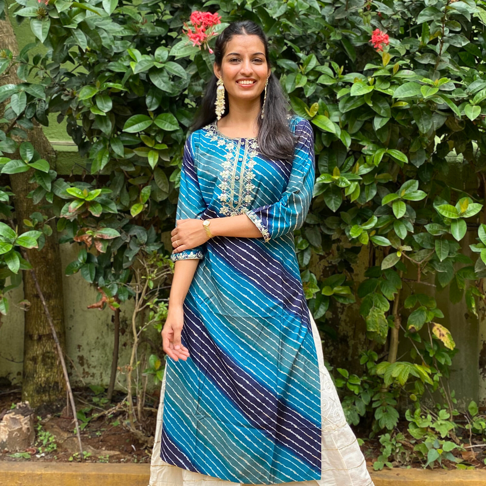 
                      
                        Shades Of Blue Leheriya Kurta with Gota Pati Work
                      
                    