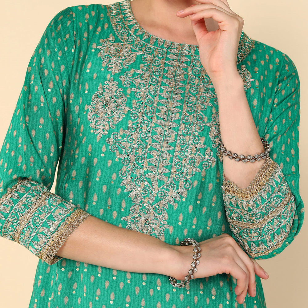 
                      
                        Parrot Green Muslin Gold dori embroidered flared kurta with straight trouser and organza printed dupatta
                      
                    