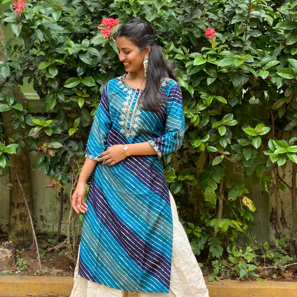 
                      
                        Shades Of Blue Leheriya Kurta with Gota Pati Work
                      
                    