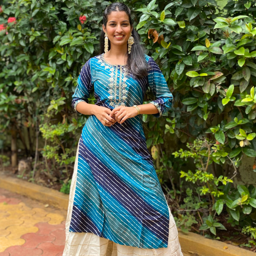 
                      
                        Shades Of Blue Leheriya Kurta with Gota Pati Work
                      
                    