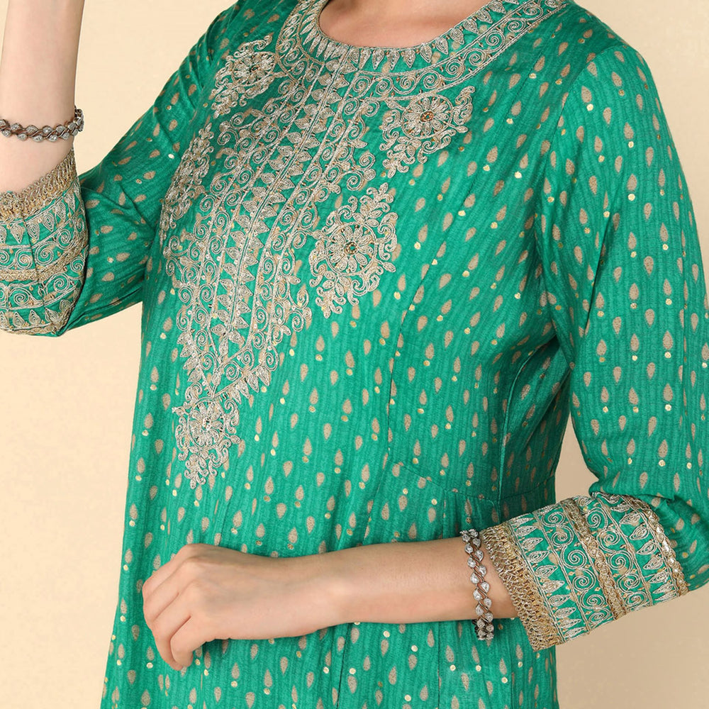 
                      
                        Parrot Green Muslin Gold dori embroidered flared kurta with straight trouser and organza printed dupatta
                      
                    