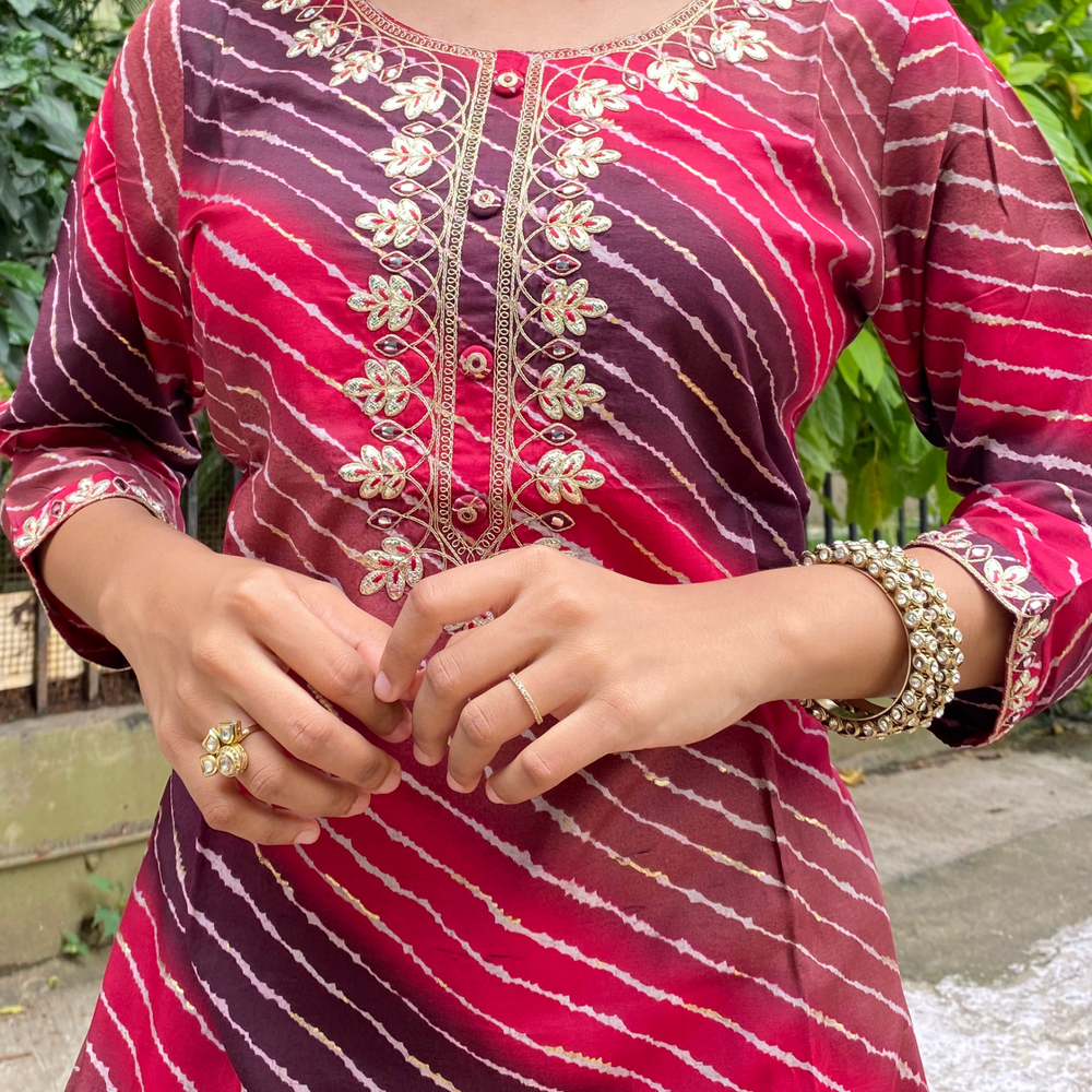 
                      
                        Shades Of Rani Pink and Violet Leheriya Kurta with Gota Pati Work
                      
                    