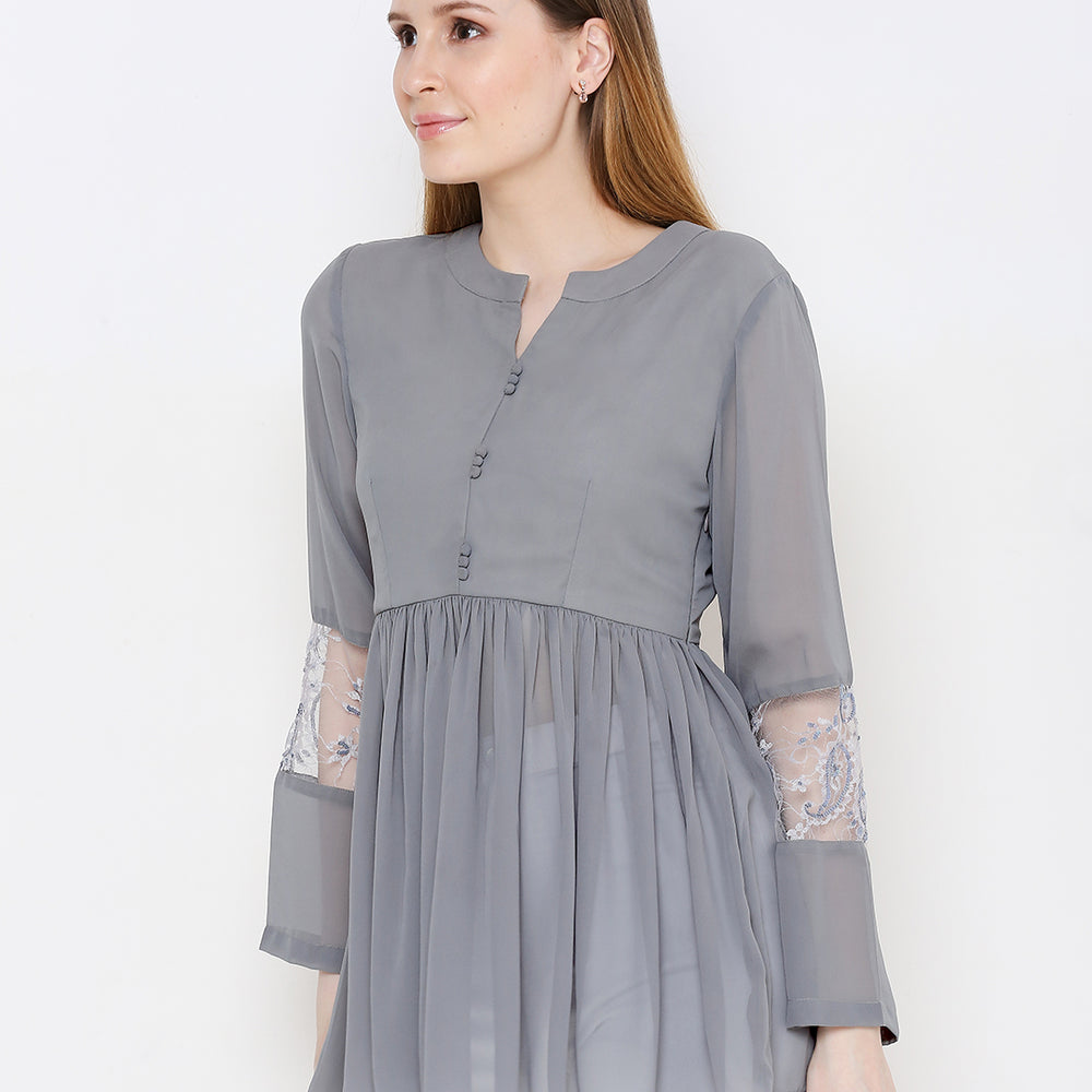 
                      
                        Grey Embellished Pure Georgette Pleated Kurti
                      
                    