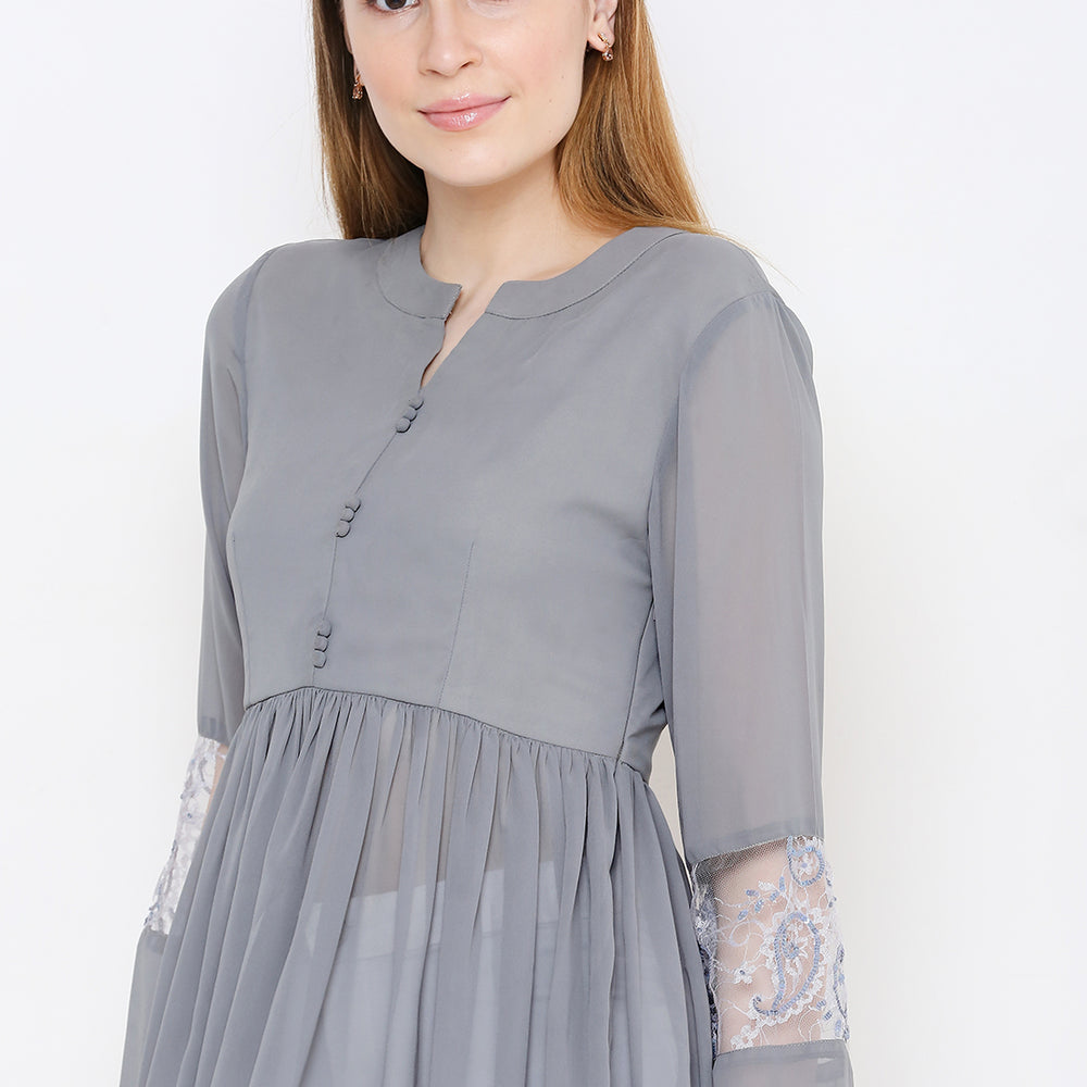 
                      
                        Grey Embellished Pure Georgette Pleated Kurti
                      
                    