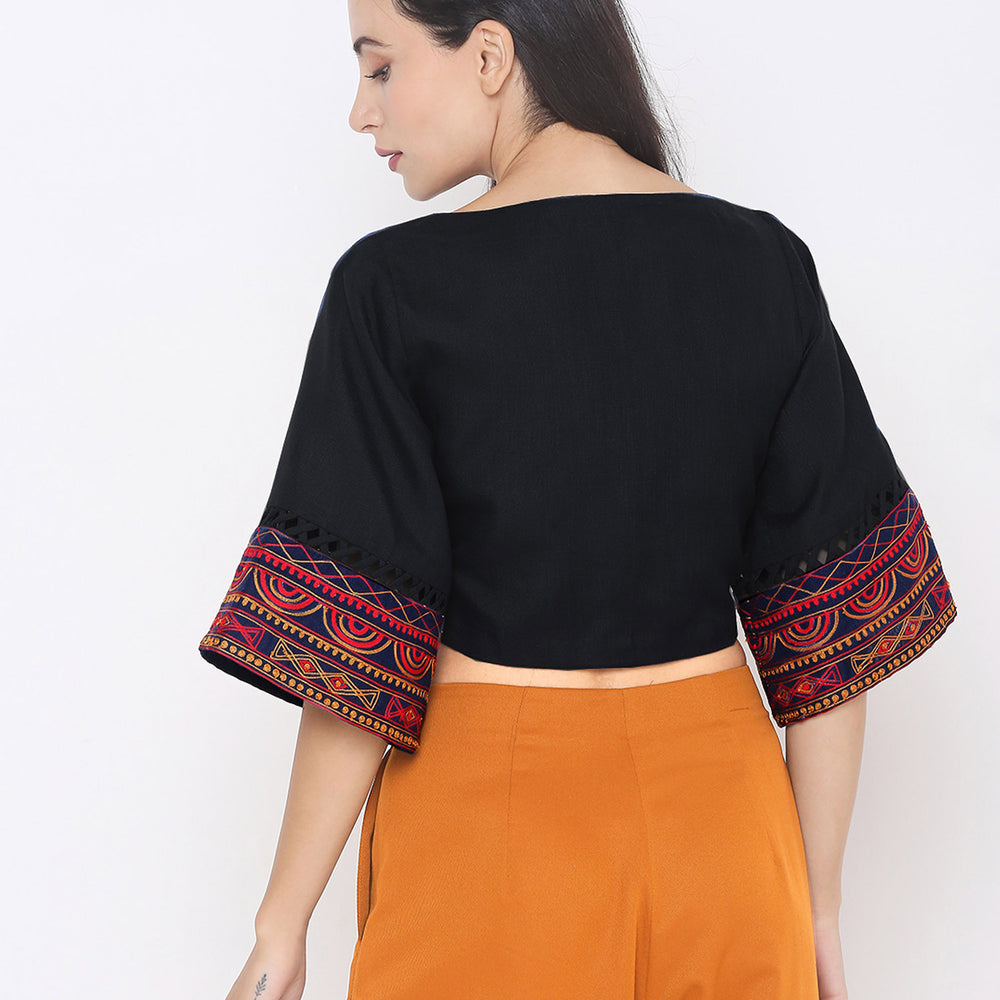 
                      
                        Women Black & Red Printed Flared Sleeves Embroidered Crop Top
                      
                    