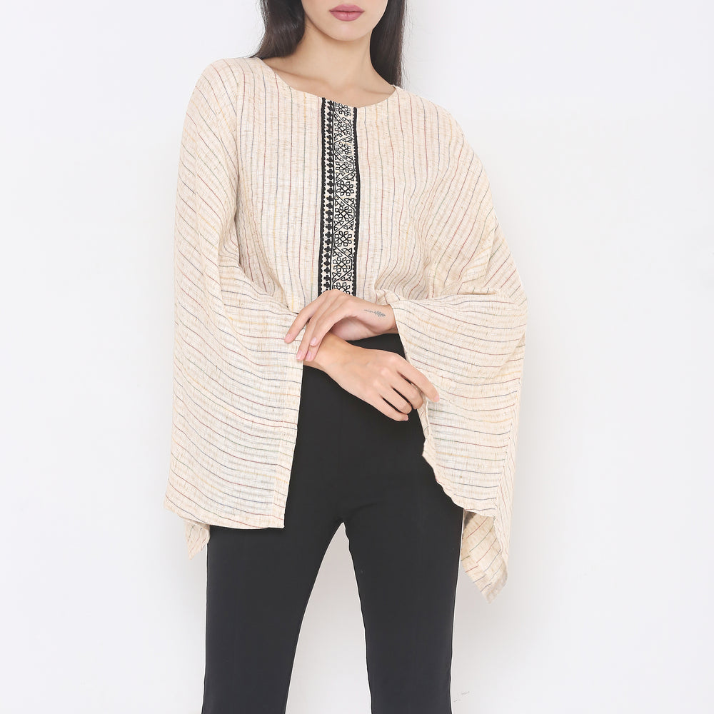 
                      
                        Aturabi Cream Colour Cape Top
                      
                    