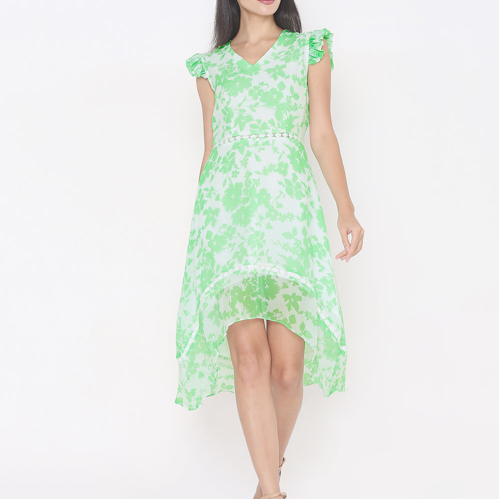 
                      
                        Elegant White Kurti with Green Floral Print and Lace
                      
                    