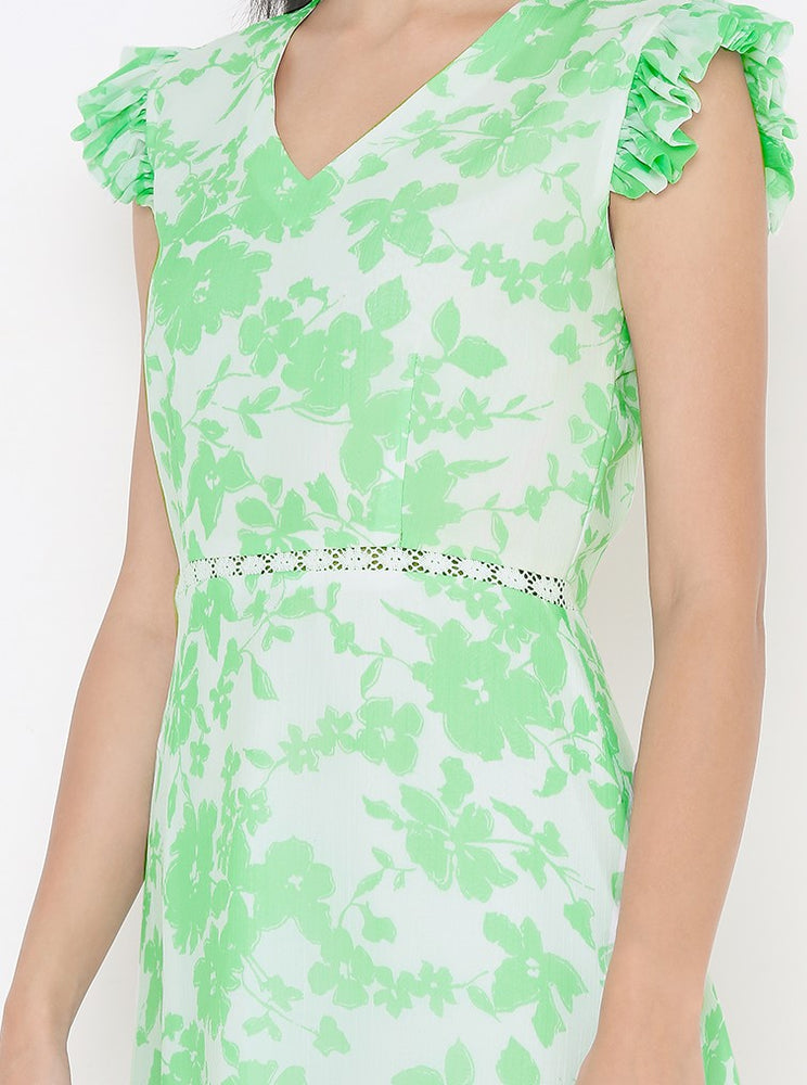 
                      
                        Elegant White Kurti with Green Floral Print and Lace
                      
                    