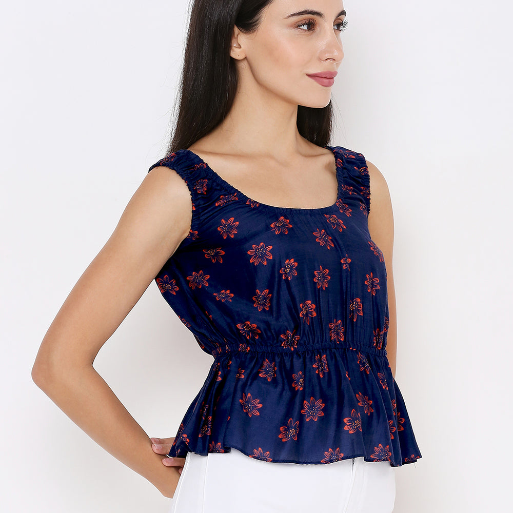 
                      
                        Aturabi Blue Floral Print Peplum Top
                      
                    