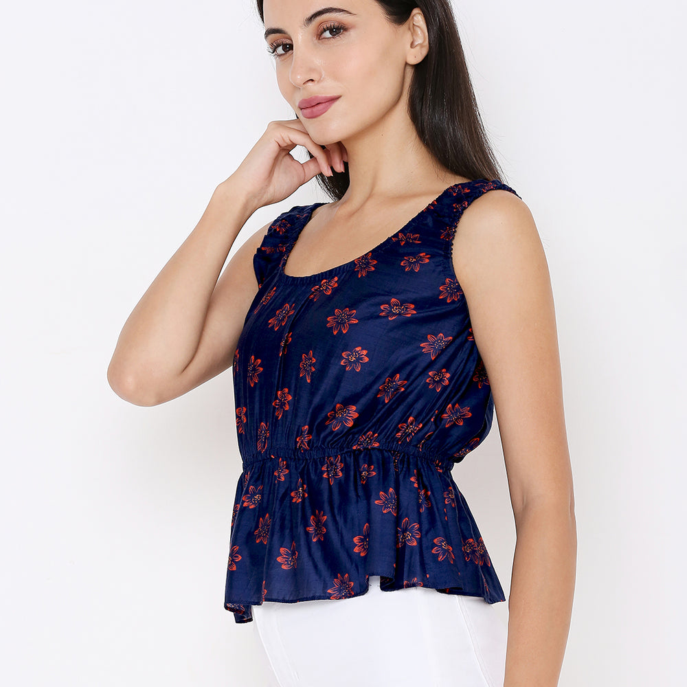 
                      
                        Aturabi Blue Floral Print Peplum Top
                      
                    