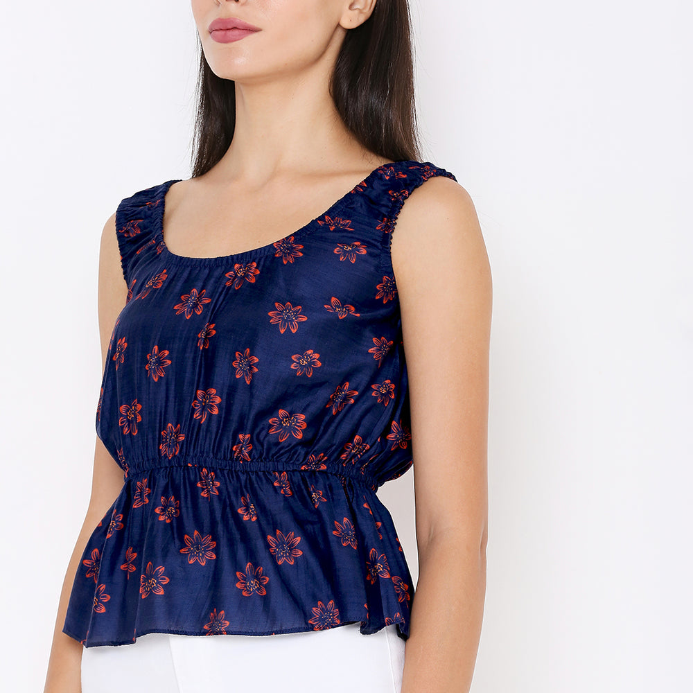 
                      
                        Aturabi Blue Floral Print Peplum Top
                      
                    