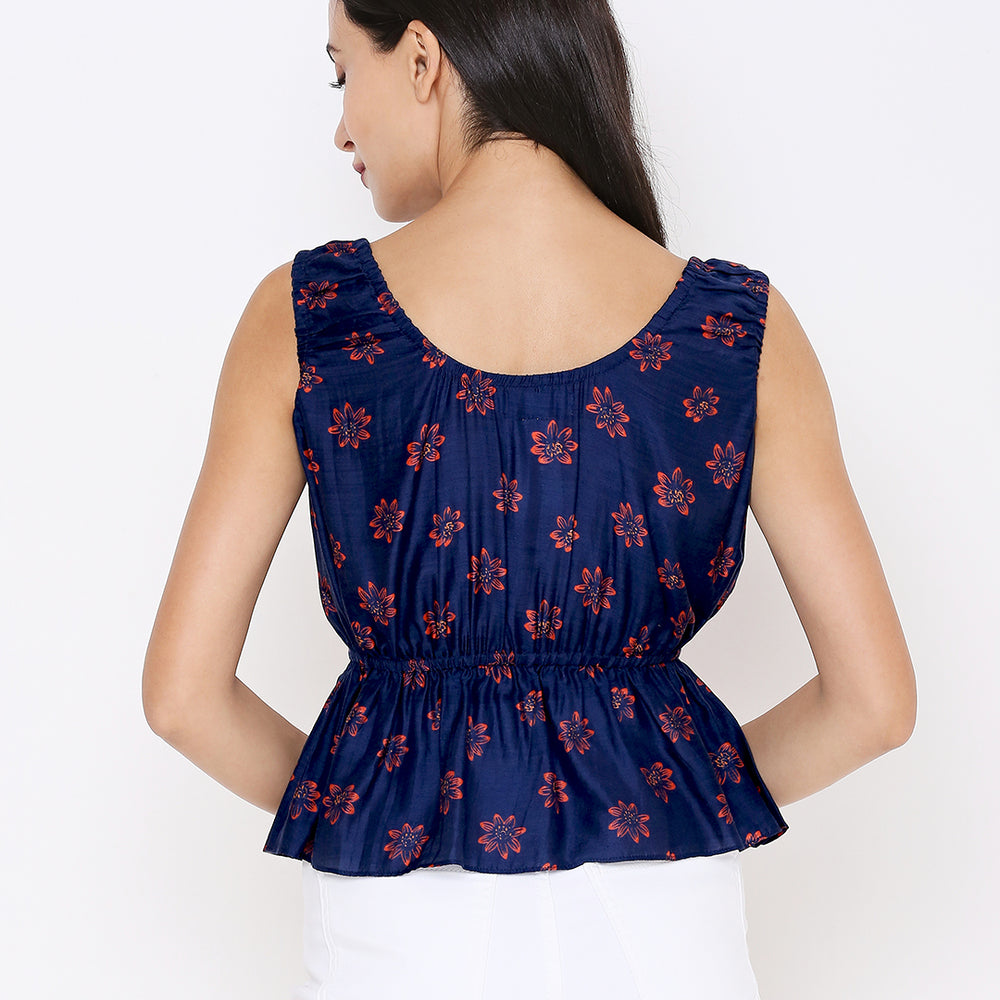 
                      
                        Aturabi Blue Floral Print Peplum Top
                      
                    